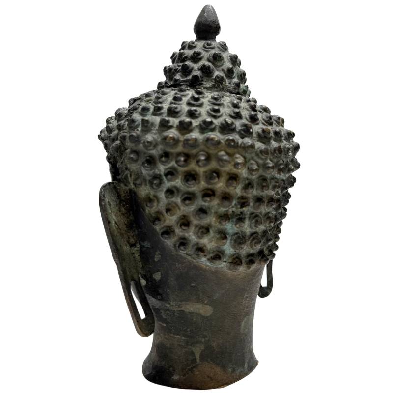 antiker buddha kopf bronze himalaya ruhige praesenz geschlossene augen