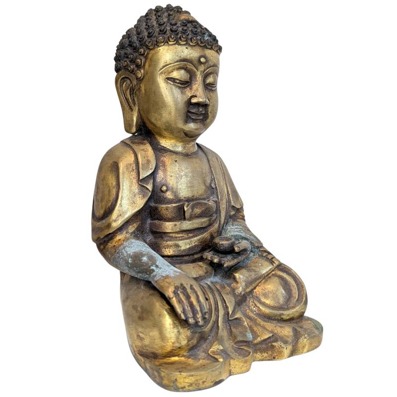 buddha figur mit ausgeglichener koerperhaltung meditation