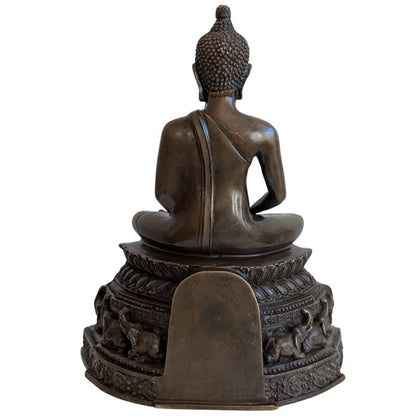 Buddha Bronze Meditation sitzend mit Elefanten Sockel ruhige Skulptur