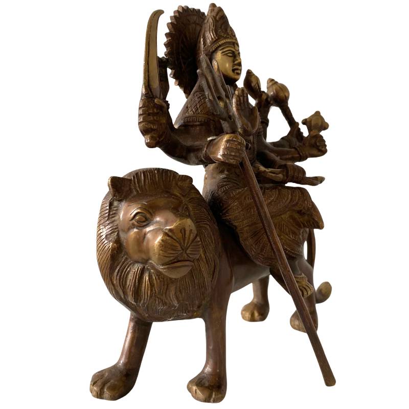 Detailaufnahme des Gesichts der Hindu-Göttin Durga aus Bronze.