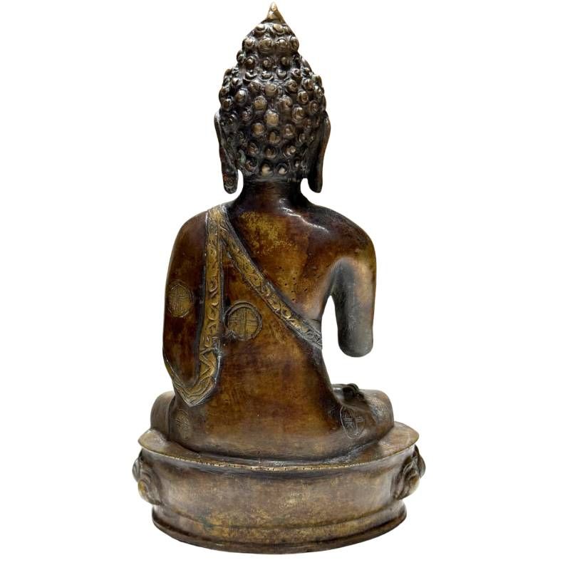 Antiker Himalaya Buddha aus Bronze mit natürlicher Patina, Vitarka Mudra, Spuren von 24k Gold, 28,5 cm Höhe, 3,8 kg schwer, Newar-Stil 18.-19. Jh., Lot 429.