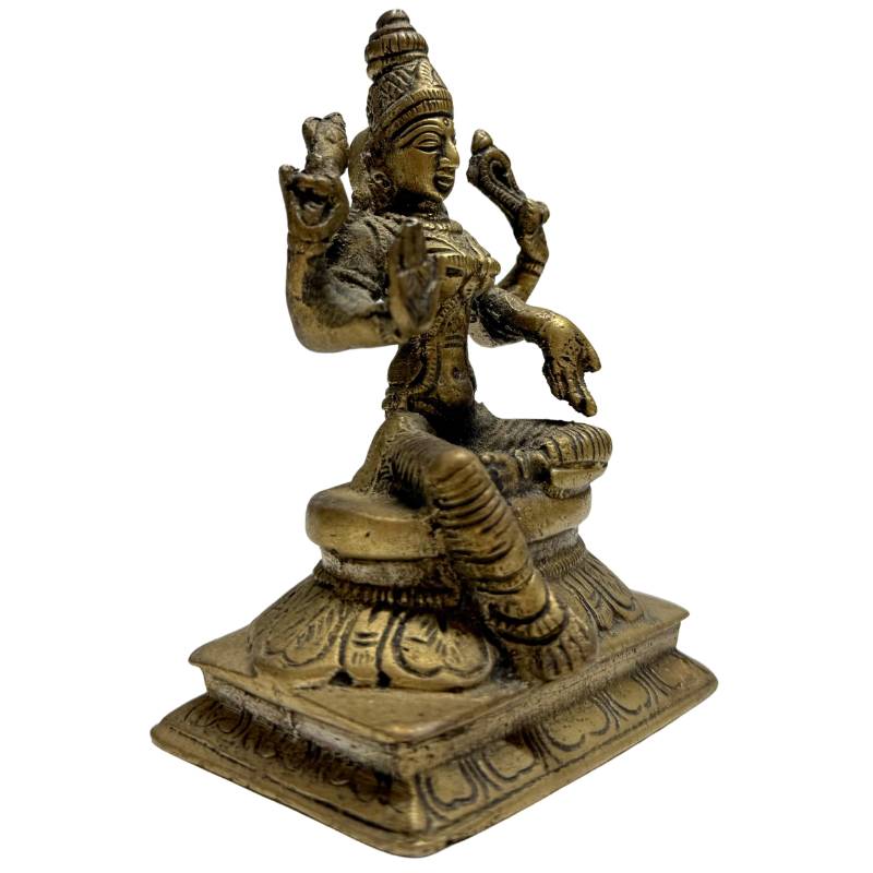 Bronzefigur der Göttin Lakshmi aus der hinduistischen Tradition
