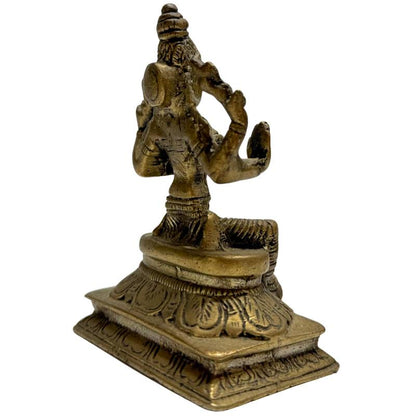 Bronzestatue der hinduistischen Göttin Lakshmi mit vier Armen
