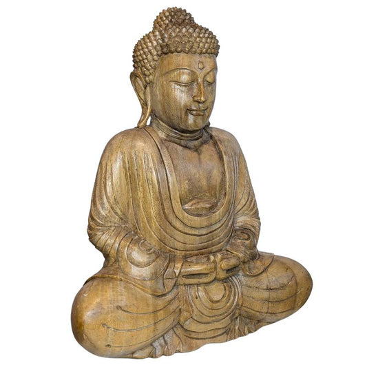 buddha figur mit geschlossenen augen meditative ausstrahlung