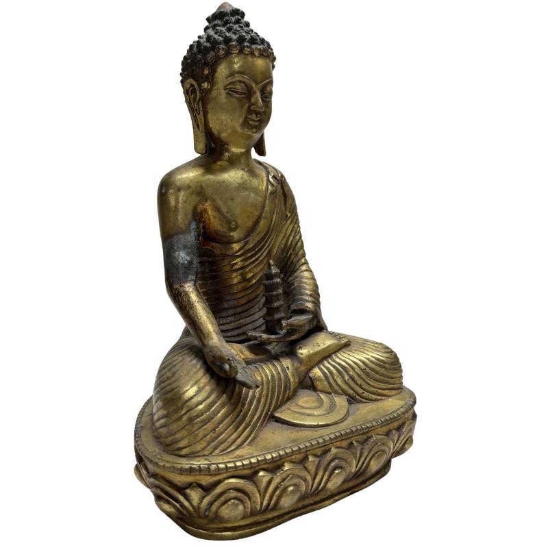 Detailansicht des friedvollen Gesichts des Medizin-Buddhas mit hochwertiger Feuervergoldung (Gilt Bronze)