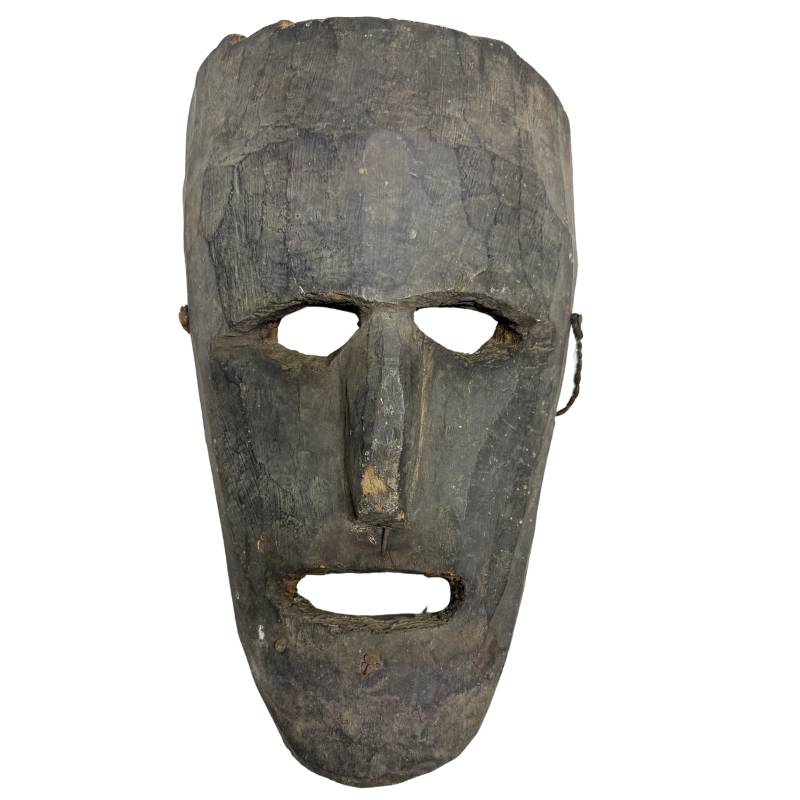 Handgeschnitzte Holzmaske aus Nepal mit langgezogenem Gesicht aus dunklem Holz
