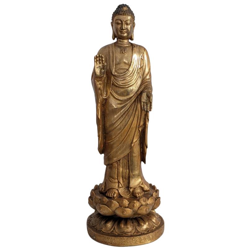 buddha figur abhaya geste ruhige stehende darstellung